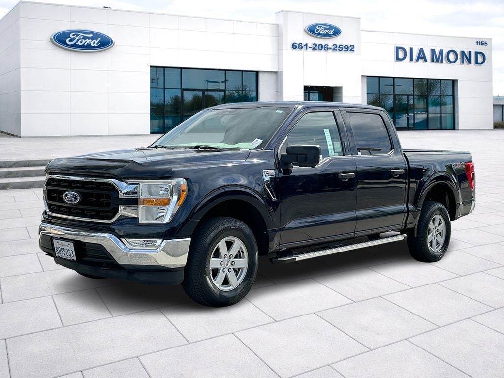 2022 Ford F-150 XLT in Blue Metallic — front three-quarter view