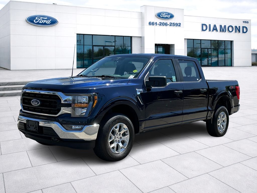 2023 Ford F-150 XLT in Blue Metallic — front three-quarter view
