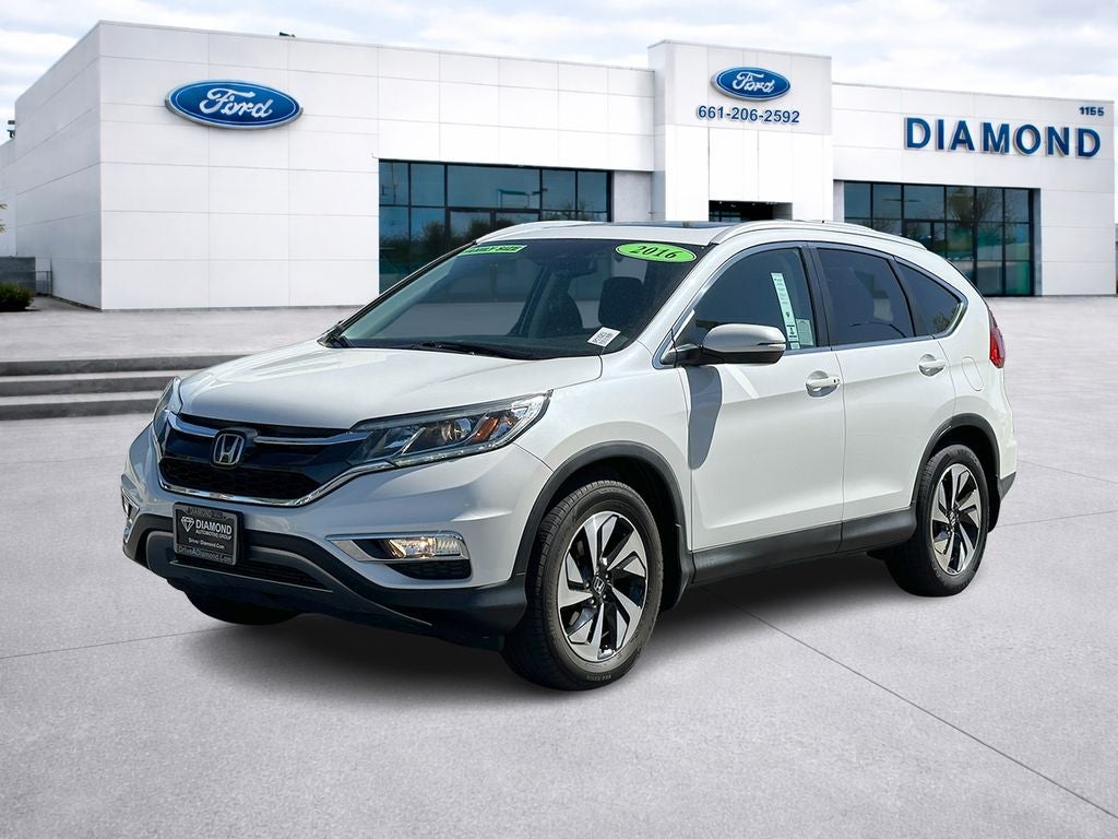 2016 Honda CR-V Touring in White Diamond Pearl — front three-quarter view
