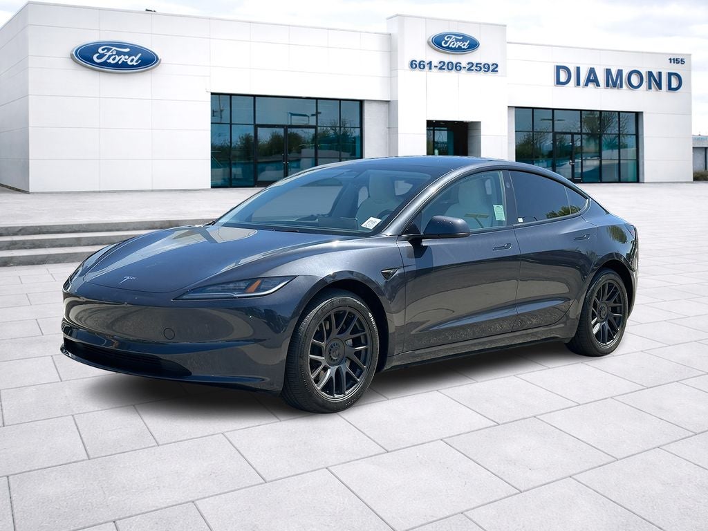 2025 Tesla Model 3 Long Range in Diamond Black — front three-quarter view