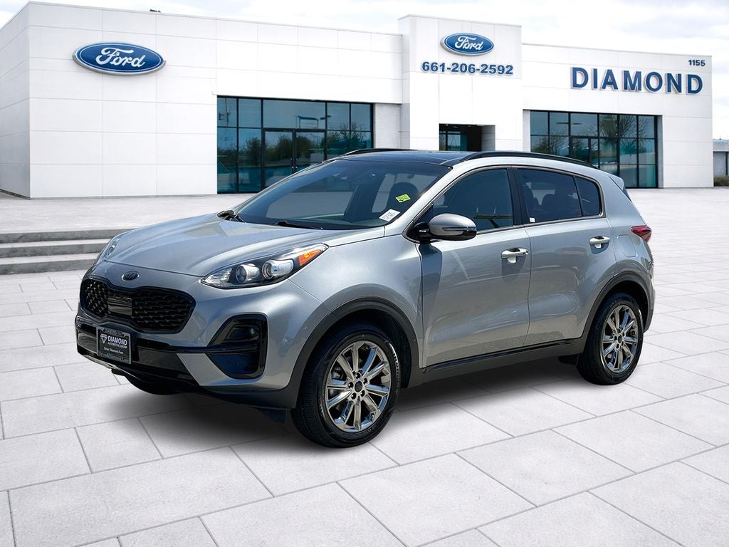 2022 Kia Sportage Nightfall in Steel Gray — front three-quarter view