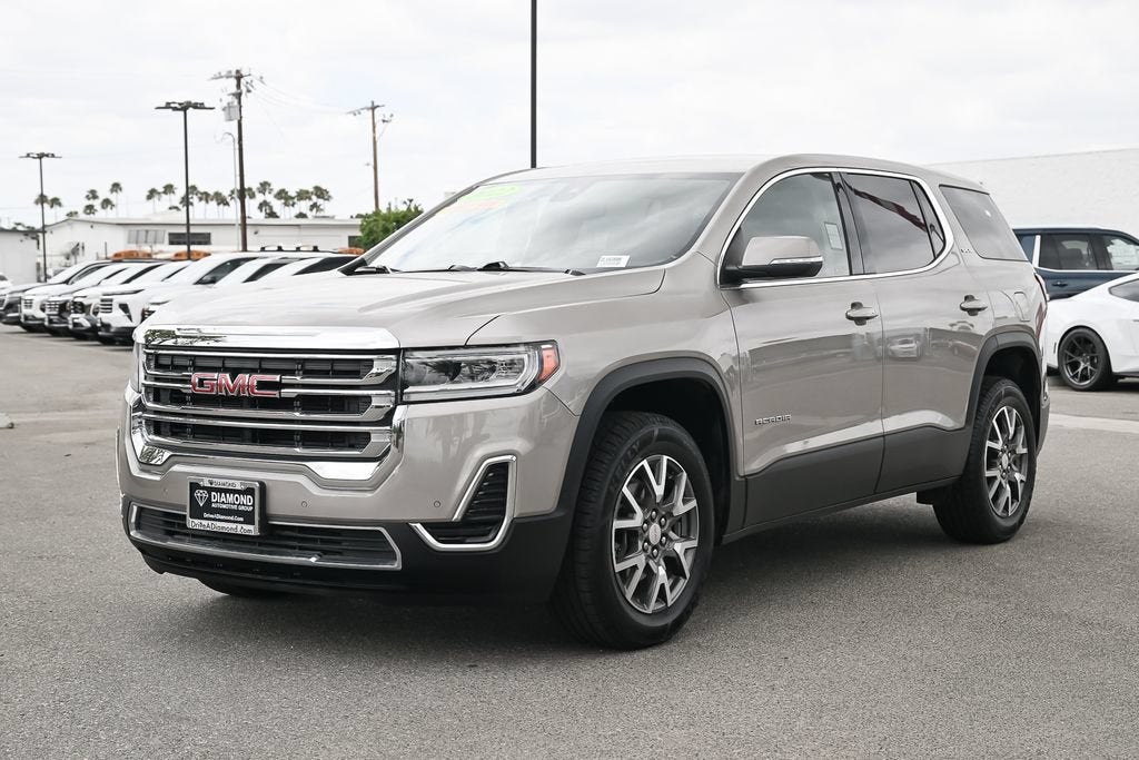 2022 GMC Acadia SLE in Light Stone Metallic — front three-quarter view