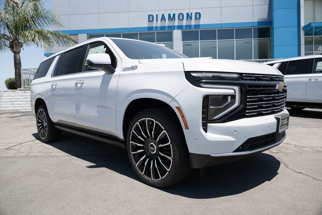 2026 Chevrolet Suburban High Country in Polar White Tricoat — front three-quarter view