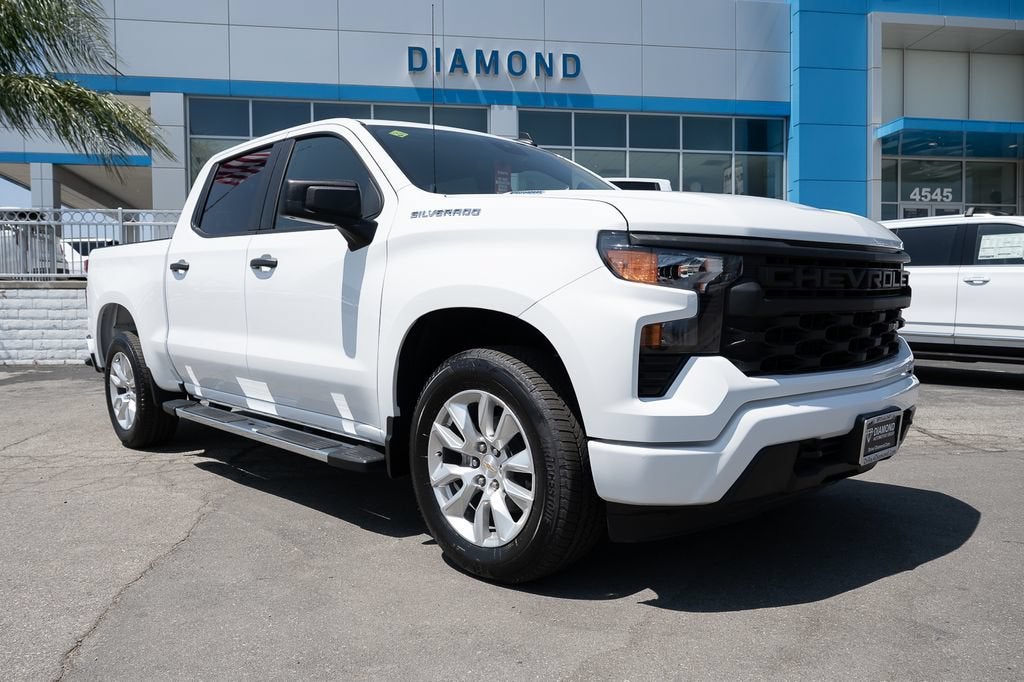 2026 Chevrolet Silverado 1500 Custom in Summit White — front three-quarter view
