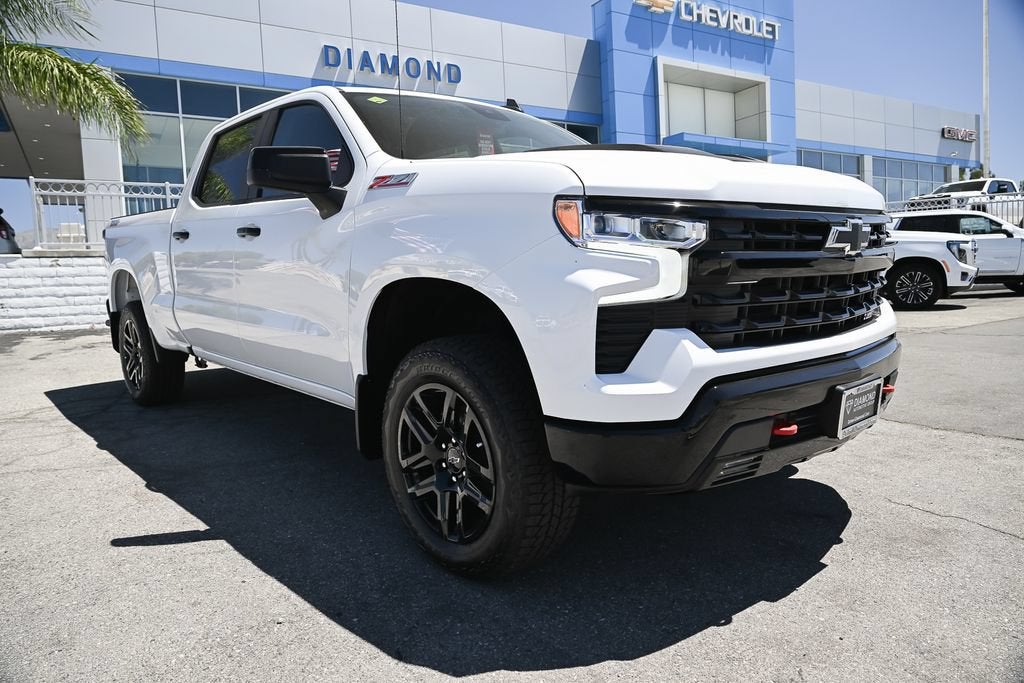 2026 Chevrolet Silverado 1500 LT Trail Boss in Summit White — front three-quarter view